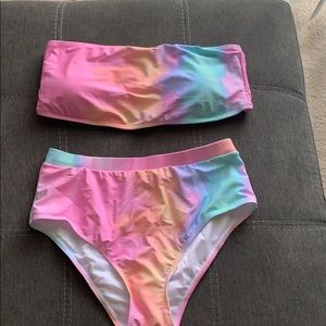 Brand new, never been worn two piece swim suit